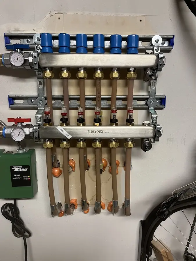 Plumber performing Gas Leak Detection at a residential property in Wendell